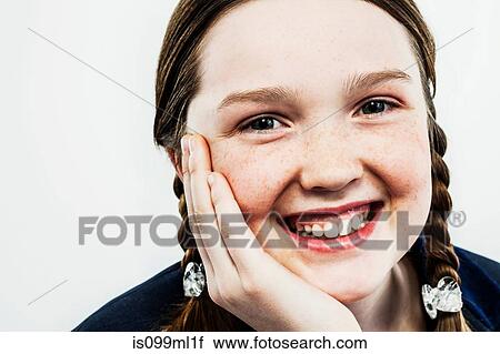 Stock Image - Girl with plaits. Fotosearch