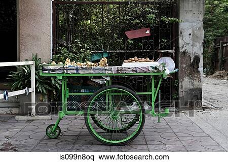 Green cart parked in market, Bangkok, Thailand View Large Photo Image Stock Photography - Green cart parked in market, Bangkok, Thailand. Fotosearch