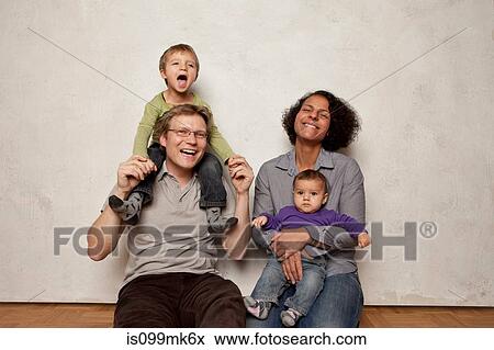 Stock Photo - Happy family. Fotosearch
