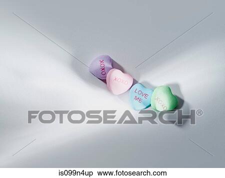 Stock Photography - Heart shaped candy, studio shot. Fotosearch