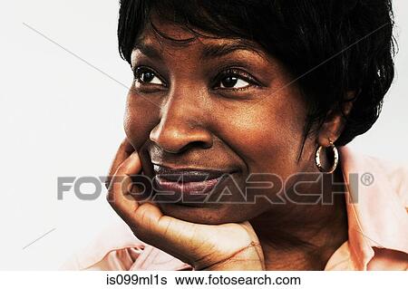 Mature woman looking away View Large Photo Image Stock Photograph - Mature woman looking away. Fotosearch