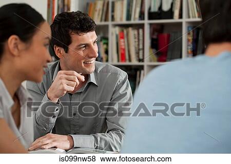 Men and women in discussion in gallery View Large Photo Image Stock Photo - Men and women in discussion in gallery. Fotosearch
