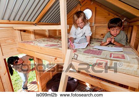 Mother looking in on children in playhouse View Large Photo Image Stock Image - Mother looking in on children in playhouse. Fotosearch