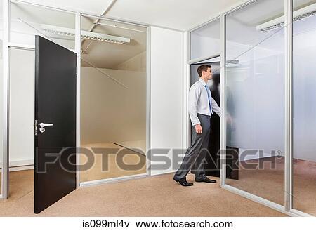 Office worker in office doorway View Large Photo Image Stock Photo - Office worker in office doorway. Fotosearch
