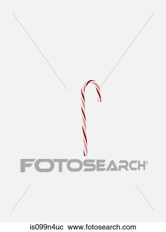Stock Image - One candy cane, studio shot. Fotosearch