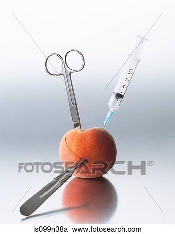 Peach and surgical instruments View Large Photo Image Stock Image - Peach and surgical instruments. Fotosearch