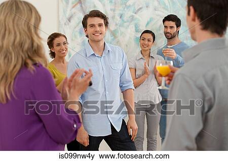 People applauding artist in gallery View Large Photo Image Stock Photo - People applauding artist in gallery. Fotosearch