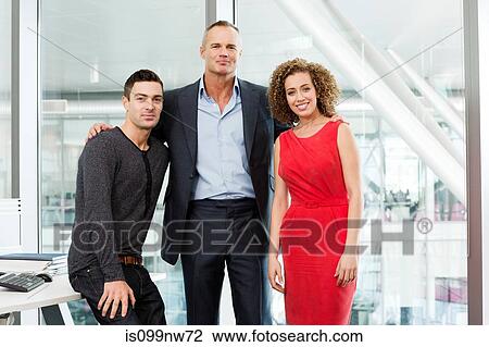 Stock Image - Portrait of business colleagues in office. Fotosearch