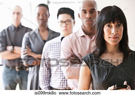 Portrait of businesspeople in a line View Large Photo Image Picture - Portrait of businesspeople in a line. Fotosearch