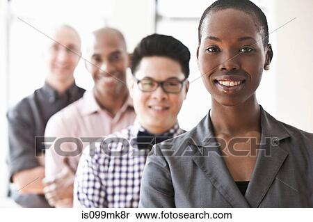 Stock Photography - Portrait of businesspeople in a line. Fotosearch
