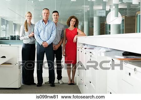 Portrait of colleagues in office, smiling View Large Photo Image Stock Image - Portrait of colleagues in office, smiling. Fotosearch