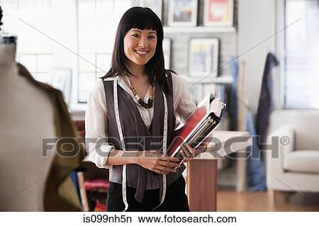 Portrait of fashion designer in studio View Large Photo Image Picture - Portrait of fashion designer in studio. Fotosearch