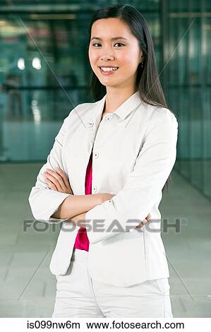 Portrait of young architect with arms folded View Large Photo Image Picture - Portrait of young architect with arms folded. Fotosearch