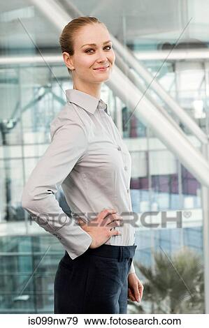 Portrait of young businesswoman, smiling View Large Photo Image Stock Photo - Portrait of young businesswoman, smiling. Fotosearch