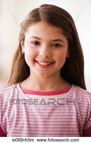 Portrait of young girl, smiling View Large Photo Image Picture - Portrait of young girl, smiling. Fotosearch