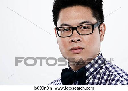 Portrait of young man against white background View Large Photo Image Picture - Portrait of young man against white background. Fotosearch