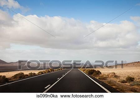 Road through Montanas del fuego, Lanzarote, Canary Islands, Spain View Large Photo Image Stock Image - Road through Montanas del fuego, Lanzarote, Canary Islands, Spain. Fotosearch
