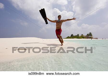 Picture - Running at Water's Edge. Fotosearch