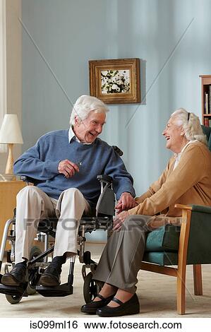 Senior couple in care home, man in wheelchair View Large Photo Image Stock Photograph - Senior couple in care home, man in wheelchair. Fotosearch