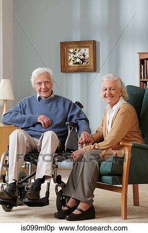 Senior couple, man in wheelchair, portrait View Large Photo Image Stock Photography - Senior couple, man in wheelchair, portrait. Fotosearch