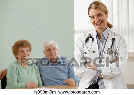 Picture - Senior couple with female doctor, portrait. Fotosearch