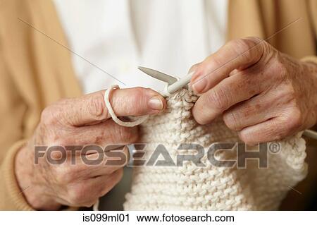 Senior woman knitting, close up View Large Photo Image Stock Image - Senior woman knitting, close up. Fotosearch