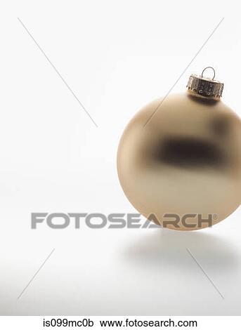 Stock Image - Single gold bauble. Fotosearch