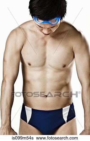 Swimmer looking down, portrait View Large Photo Image Stock Photograph - Swimmer looking down, portrait. Fotosearch