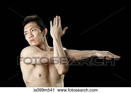 Swimmer stretching arm View Large Photo Image Stock Image - Swimmer stretching arm. Fotosearch