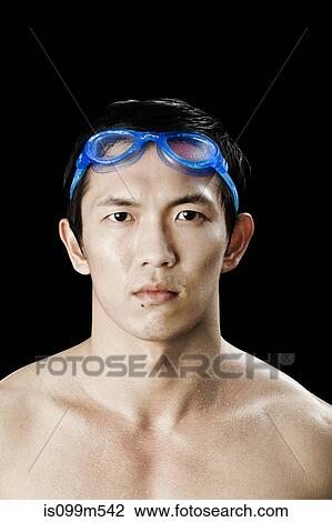 Swimmer wearing swimming goggles View Large Photo Image Stock Image - Swimmer wearing swimming goggles. Fotosearch