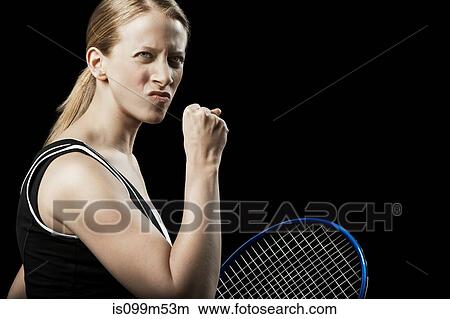 Tennis player punching the air View Large Photo Image Picture - Tennis player punching the air. Fotosearch