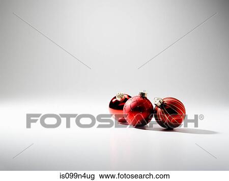 Stock Image - Three baubles, studio shot. Fotosearch
