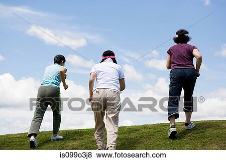 Three senior women walking up a hill View Large Photo Image Stock Photo - Three senior women walking up a hill. Fotosearch