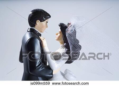 Wedding cake figurines, studio shot View Large Photo Image Stock Photo - Wedding cake figurines, studio shot. Fotosearch