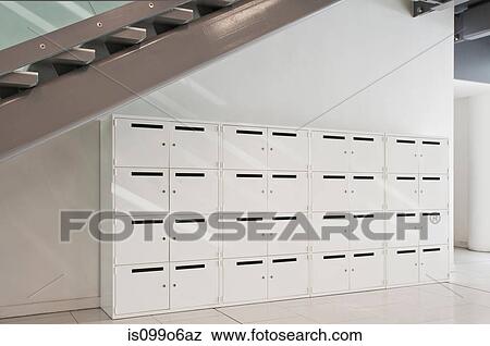 White lockers in empty office block View Large Photo Image Stock Photo - White lockers in empty office block. Fotosearch