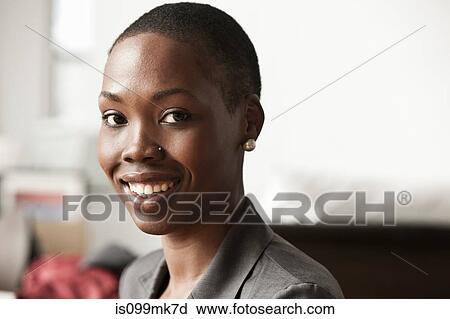 Young businesswoman, portrait View Large Photo Image Stock Image - Young businesswoman, portrait. Fotosearch