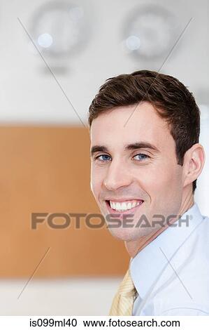 Stock Image - Young man, close up portrait. Fotosearch
