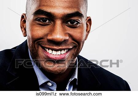 Young man smiling View Large Photo Image Stock Photo - Young man smiling. Fotosearch