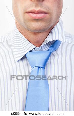 Young man with messy shirt and tie View Large Photo Image Stock Photograph - Young man with messy shirt and tie. Fotosearch