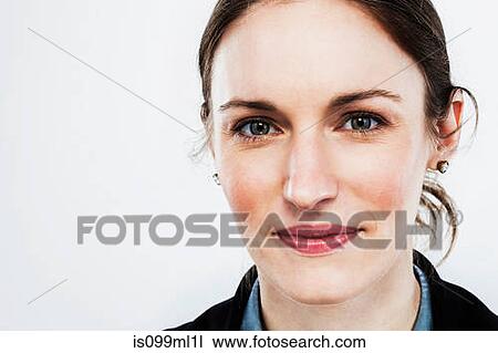 Young woman looking at camera View Large Photo Image Stock Image - Young woman looking at camera. Fotosearch