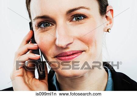 Young woman on smartphone View Large Photo Image Picture - Young woman on smartphone. Fotosearch