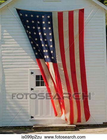 American flag on the front of a house View Large Photo Image Stock Photograph - American flag on the front of a house. Fotosearch