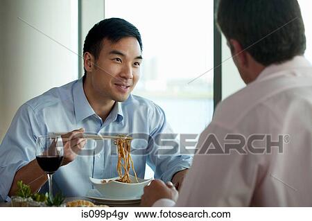 Businessman eating noodles View Large Photo Image Stock Photo - Businessman eating noodles. Fotosearch