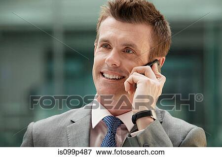 Businessman on cell phone, portrait View Large Photo Image Stock Photo - Businessman on cell phone, portrait. Fotosearch
