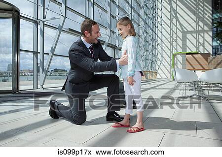 Father arriving in airport with daughter View Large Photo Image Stock Photo - Father arriving in airport with daughter. Fotosearch