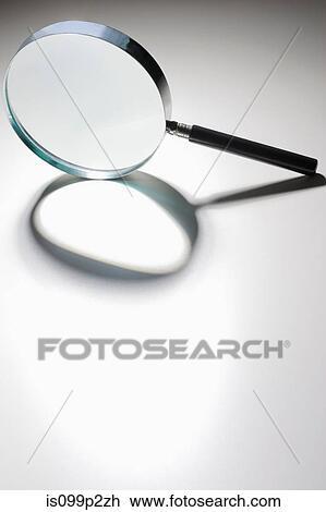 Stock Image - Magnifying glass. Fotosearch