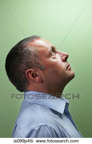 Mature male teacher looking up View Large Photo Image Stock Image - Mature male teacher looking up. Fotosearch