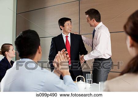 Multi racial business meeting View Large Photo Image Stock Image - Multi racial business meeting. Fotosearch