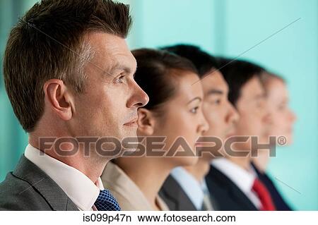 Multi racial businesspeople in a line, portrait View Large Photo Image Picture - Multi racial businesspeople in a line, portrait. Fotosearch
