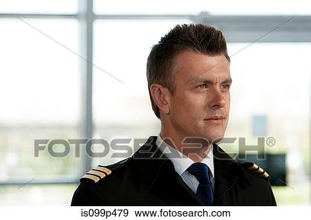 Pilot looking away, portrait View Large Photo Image Stock Photo - Pilot looking away, portrait. Fotosearch